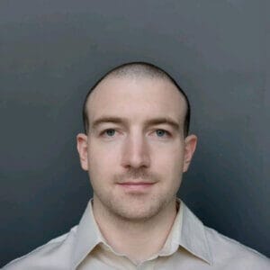 Headshot photo of Erik