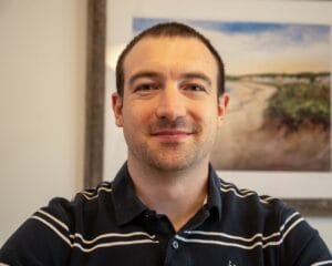 Headshot image of Erik